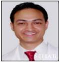 Dr. Mahesh Ramola